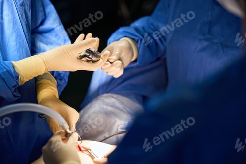 Preview: Surgery in Progress with Medical Professionals at Work