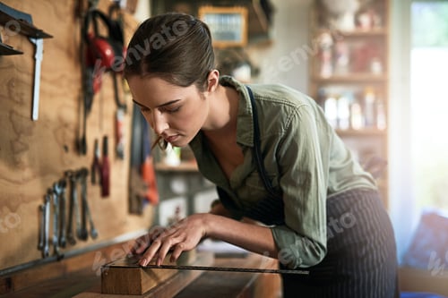 Preview: Creativity is her middle name. Shot of a young female designer in her workshop.