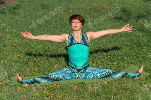 Preview: Yoga. The Girl In The Park Is Practicing Yoga