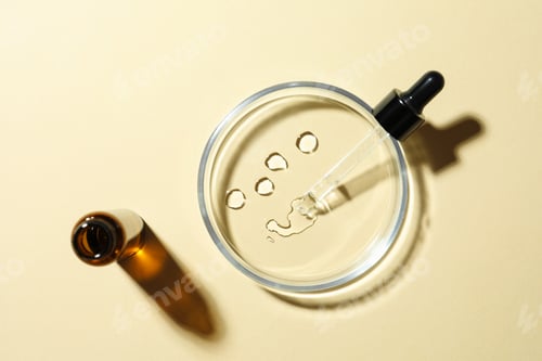 Preview: Petri dish and cosmetic product on beige background, flat lay