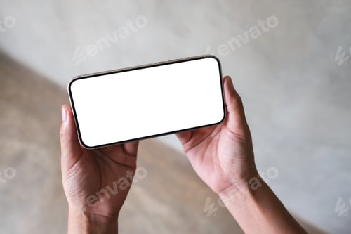 Preview: Top view mockup image of a woman holding mobile phone with blank desktop screen