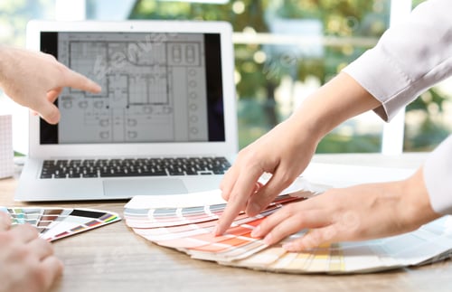 Preview: Team of designers working with color palette at office table, closeup