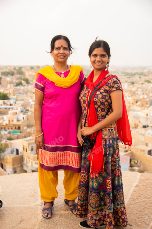 Preview: Woman tourist at golden fort Jaisalmer, India.