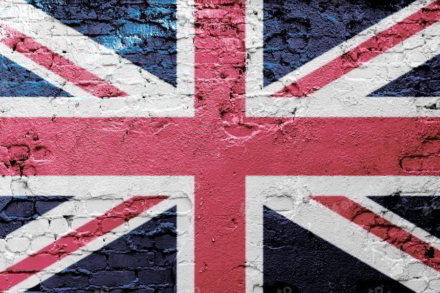 Cover for a graffiti of national flag of the Uk painted on the rusty wall