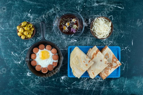 Preview: Breakfast board with fried eggs, sausage and pancakes