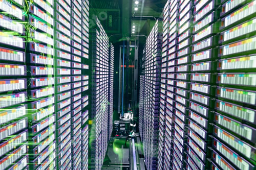 Preview: Data center with multiple rows of fully operational server racks