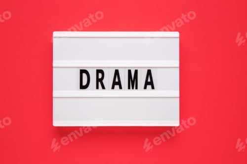 Preview: Lightbox with word drama on red background.