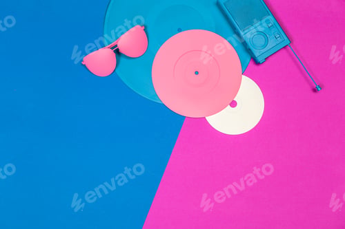 Preview: Colorful vinyl records and retro items on vibrant background for a lively music scene