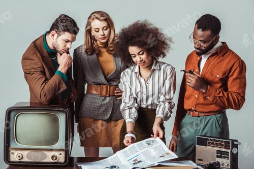 Preview: multicultural retro styled journalists in newsroom isolated on grey