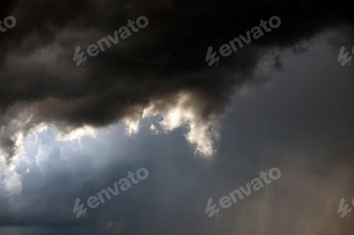 Preview: Background of dark clouds before a thunder-storm.