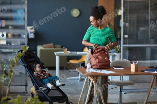 Preview: Busy Mother Carrying Baby in Office Environment