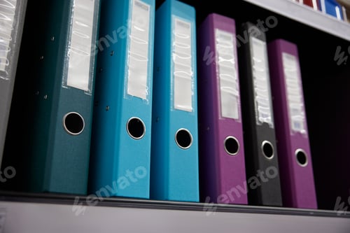 Preview: Rack with various office or school folders at stationery store