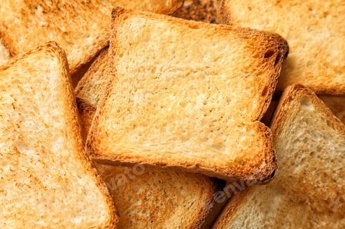 Preview: Toasted slices of bread as background, closeup