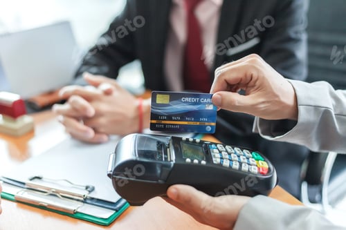 Preview: Businessman with credit cards. Payment and spending with credit cards.