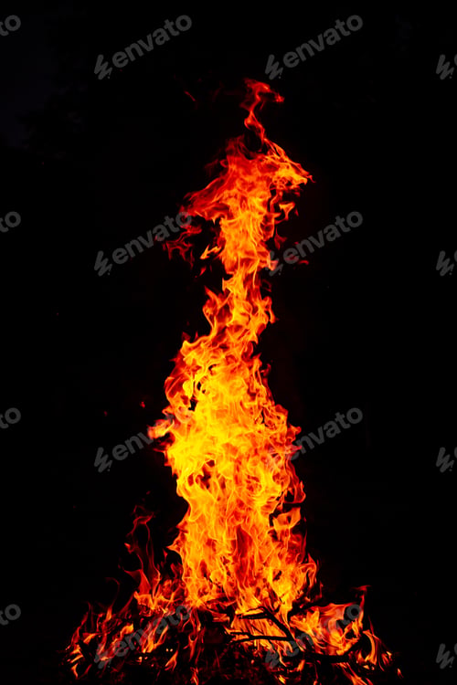 Preview: Beautiful vertical shot of a large burning fire at night
