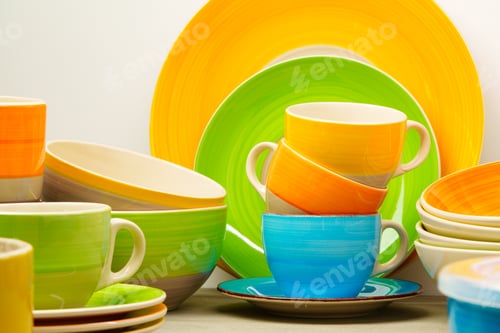 Preview: Set of colored ceramic dishware front view