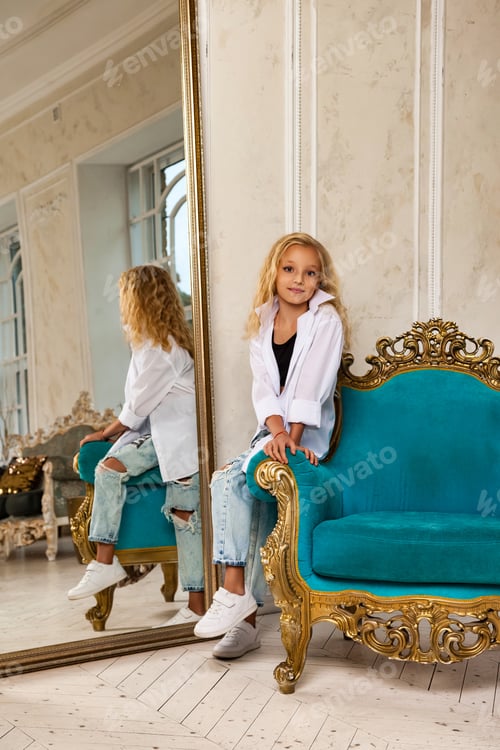 Preview: Stylish Girl Poses in Front of Ornate Mirror