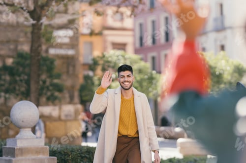 Preview: Man in modern clothes waving to the woman in front of him outdoors
