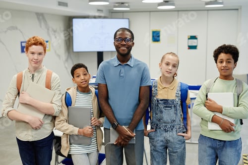 Preview: Smiling Teacher with Group of Kids