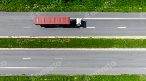 Preview: Aerial view cargo truck on highway logistic cargo transport, Semi truck trailer on highway