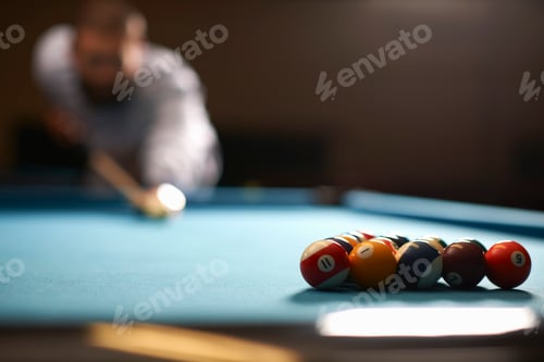 Preview: Man playing pool in club