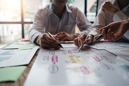 Preview: Team Develops Business Plan in Bright Office