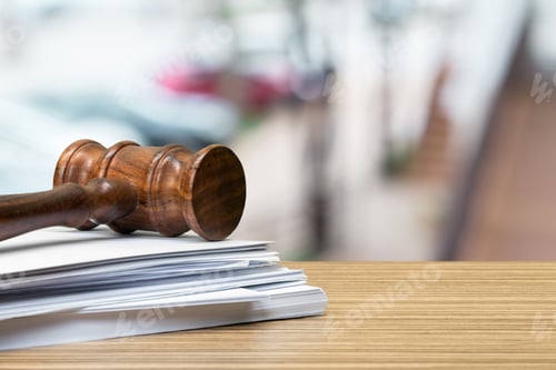 Preview: Wooden gavel on table close up. Justice concept