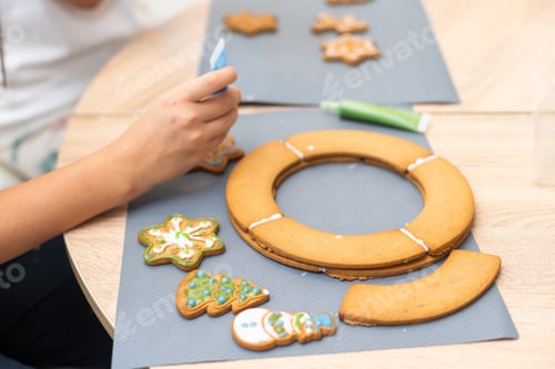 Preview: Cooking Christmas gingerbread. Child decorating cookies. Festive homemade decorated sweets