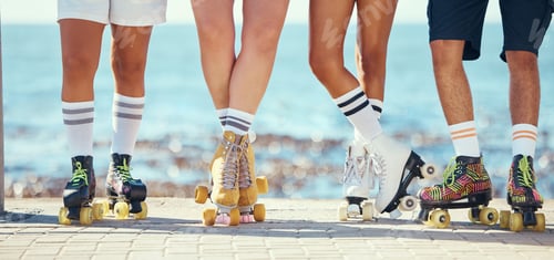Preview: Roller skates, friends and beach with a group of people on the promenade at the beach with the sea