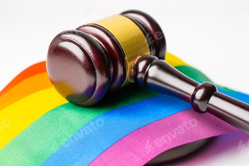 Preview: Gavel for judge lawyer on rainbow flag, symbol of LGBT pride month celebrate annual in June