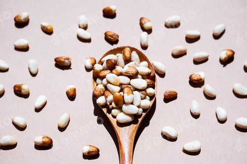 Preview: Pine Nuts in Wooden Spoon, Close Up.