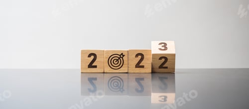 Preview: hand flip 2022 to 2023 block with dartboard sign.