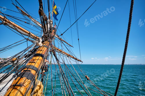Preview: Bowspirit of old wooden sail ship with lots of rope gear