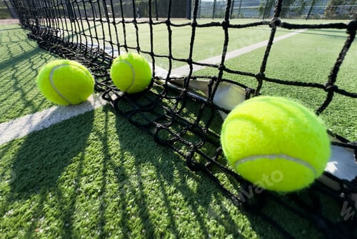 Preview: Tennis ball on grass tennis court