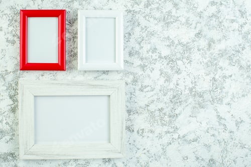 Preview: top view empty photo frames on grey background free space