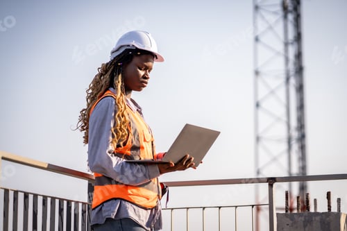 Preview: Engineer inspect building structure technicians looking at analyzing unfinished construction project