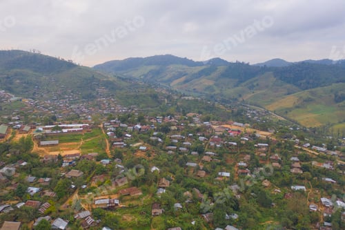 Preview: Immigration refugees residential village houses in countryside, rural area. Local community houses
