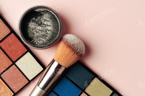 Preview: decorative cosmetics on pink background. close up