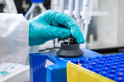 Preview: Using a vortex mixer, a chemist agitates samples before conducting HPLC analysis.