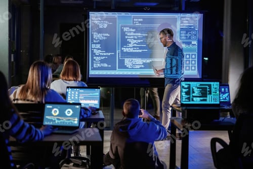 Preview: Talking about project. Male business trainer is against projector with data, teaching people