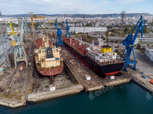 Preview: aerial view shipyard dry dock maintenance and repair cargo ship transport and oil ships in sea