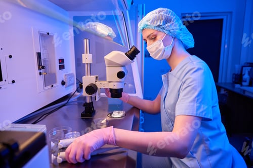 Preview: Focused laboratory scientist is preparing for cell manipulation procedure