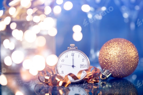 Preview: New Year's at midnight - Old clock with Christmas decoration and holiday lights