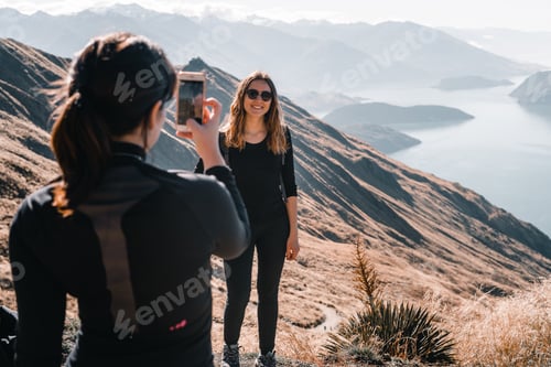 Preview: blonde caucasian girl wearing sunglasses black t-shirt and black pants smiling content and happy