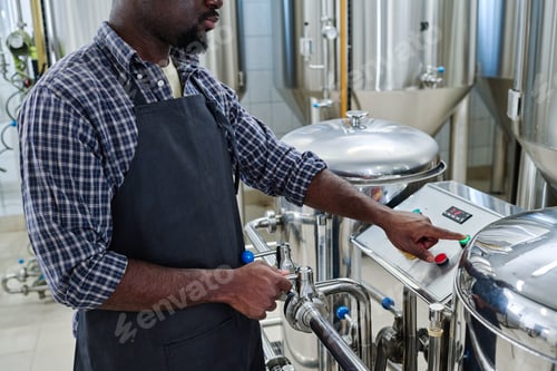 Preview: Worker turning on the equipment