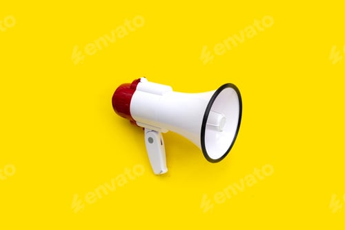 Preview: Red and white megaphone on yellow background.