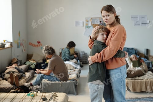 Preview: Miserable young woman embracing her son