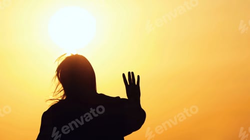 Preview: Young Woman Silhouette in Sunset