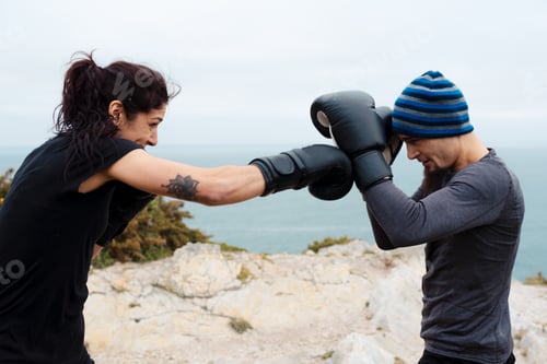 Preview: Boxers exercising on cliff