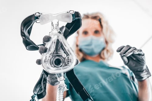 Preview: Nurse applies a mask of the mechanical ventilation machine